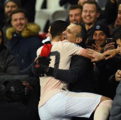 Diogo Dalot with his father.